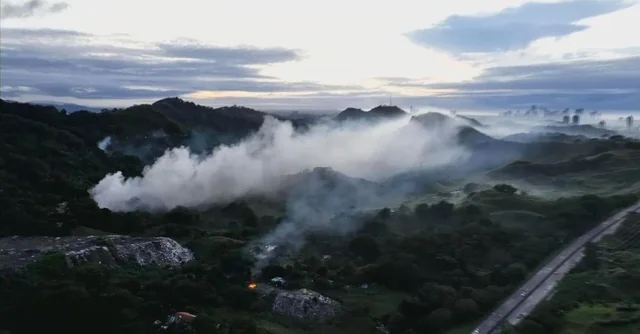 巴拿马城部分地区因非法垃圾场火灾而笼罩在烟雾中